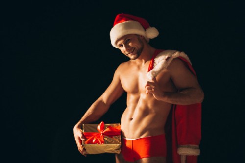 sexy-santa-man-naked-black-background_1303-12810